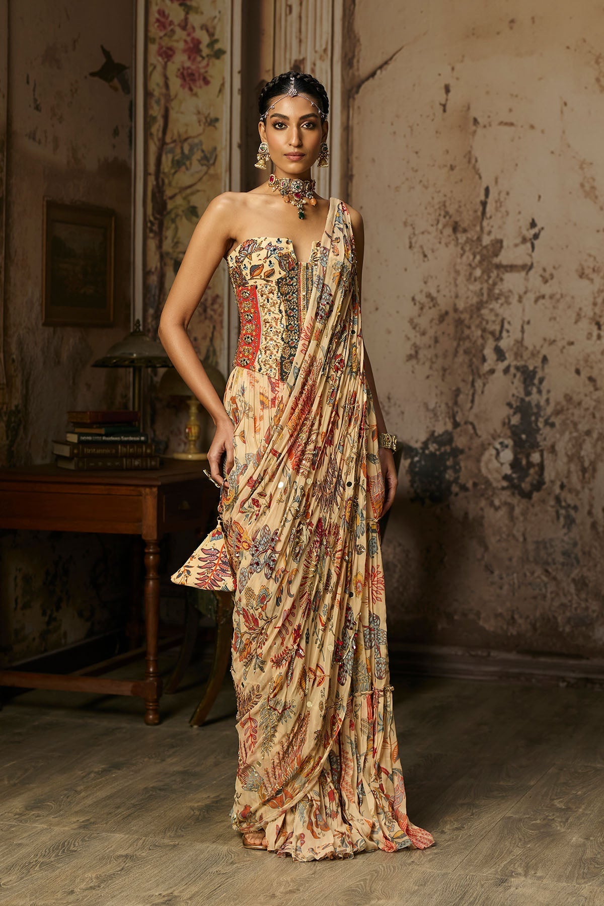 Natasha Luthra In Beige Printed And Highlighted Corset With Tiered Skirt Saree Set