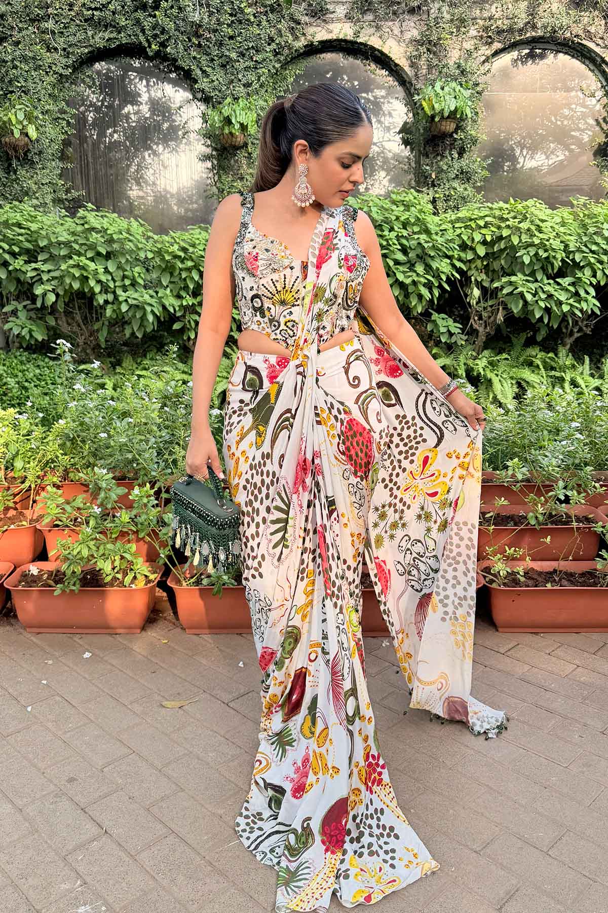 Simran Luthria In Ivory Print And Highlighted Corset With Dhoti Skirt Saree Set