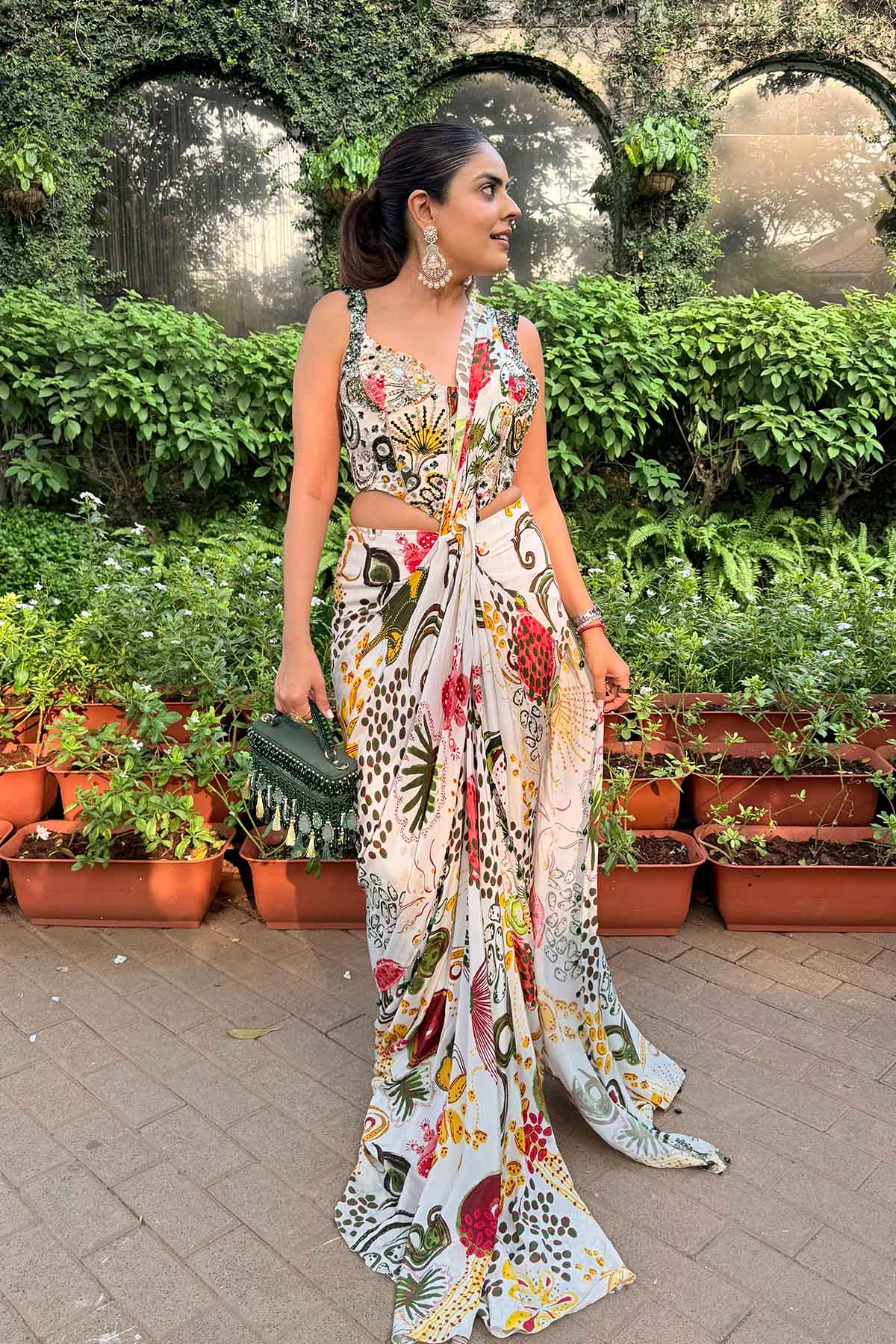 Simran Luthria In Ivory Print And Highlighted Corset With Dhoti Skirt Saree Set
