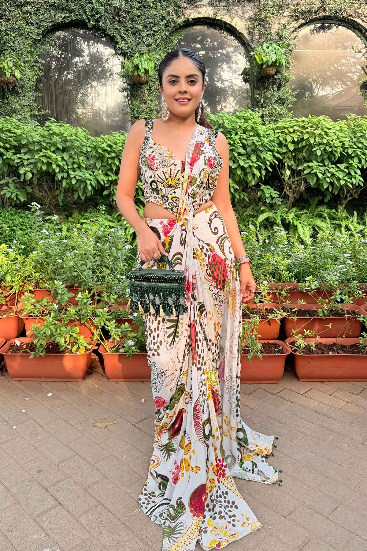 Simran Luthria In Ivory Print And Highlighted Corset With Dhoti Skirt Saree Set