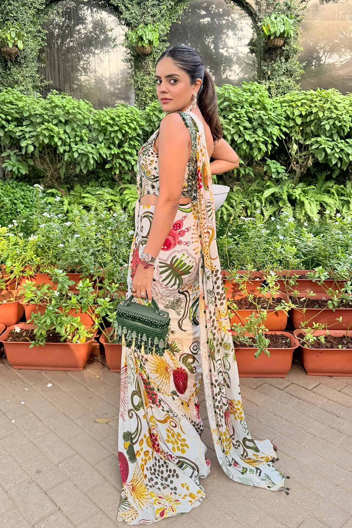 Simran Luthria In Ivory Print And Highlighted Corset With Dhoti Skirt Saree Set