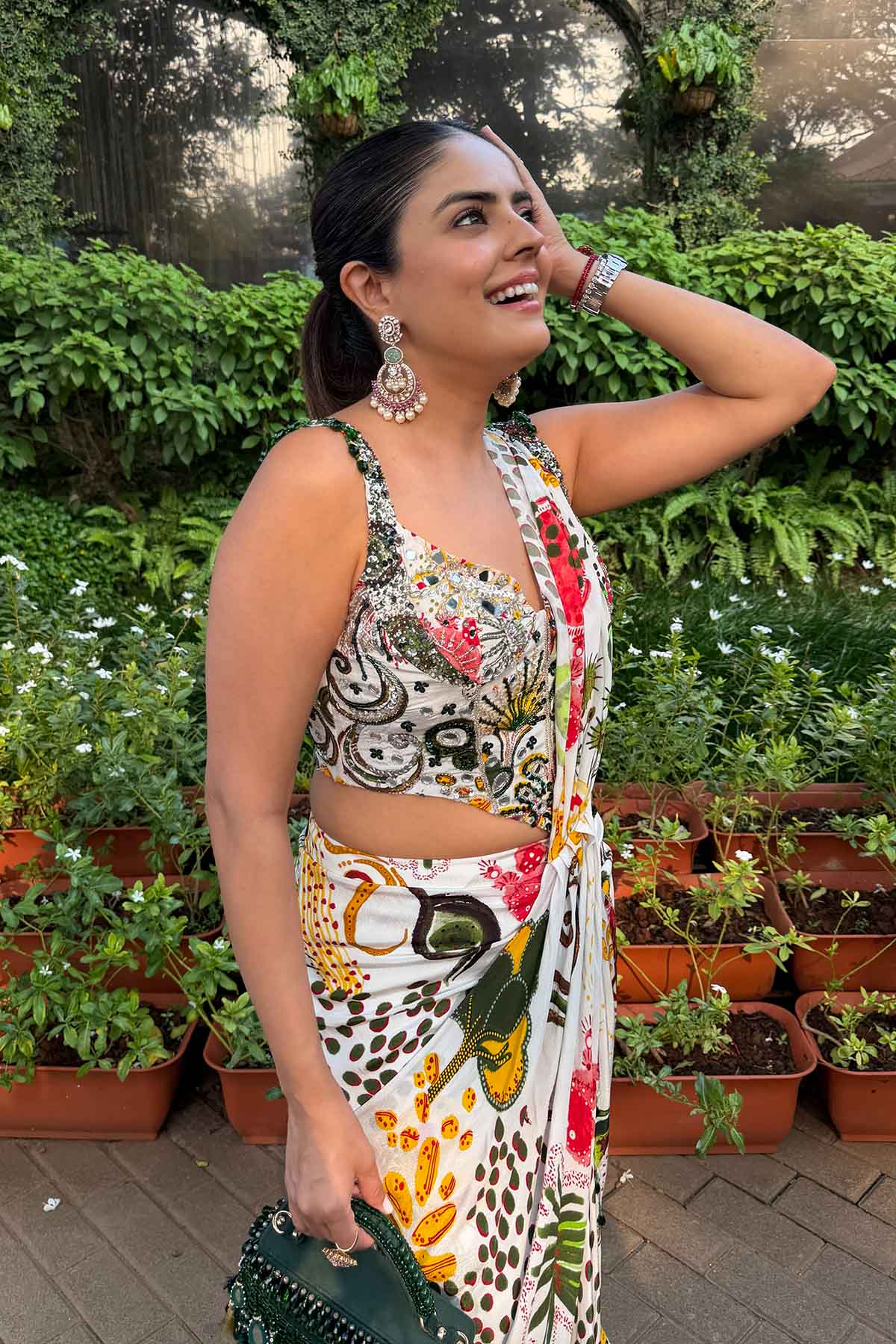 Simran Luthria In Ivory Print And Highlighted Corset With Dhoti Skirt Saree Set