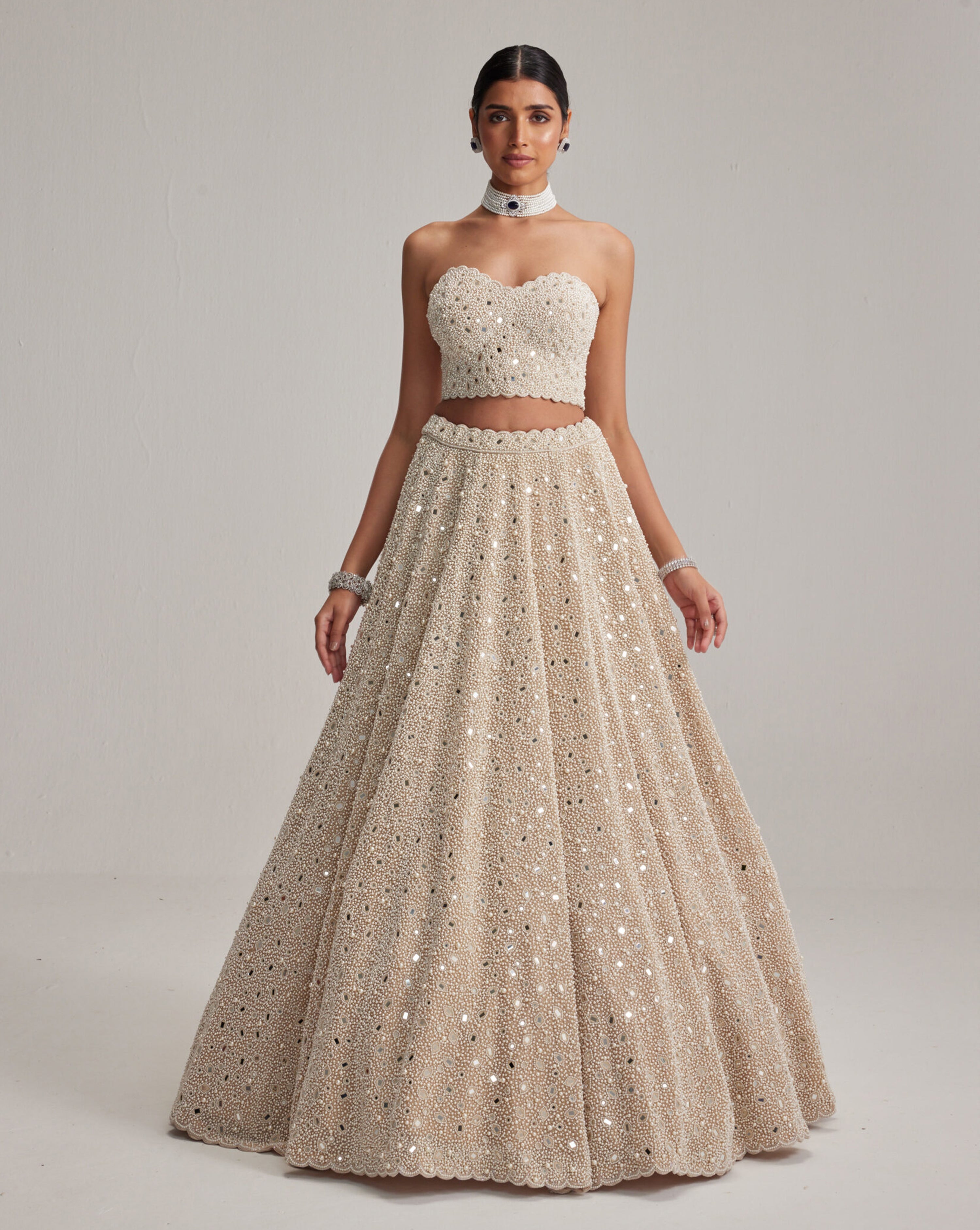 Light Beige Dense mirror and pearl Corset lehenga set