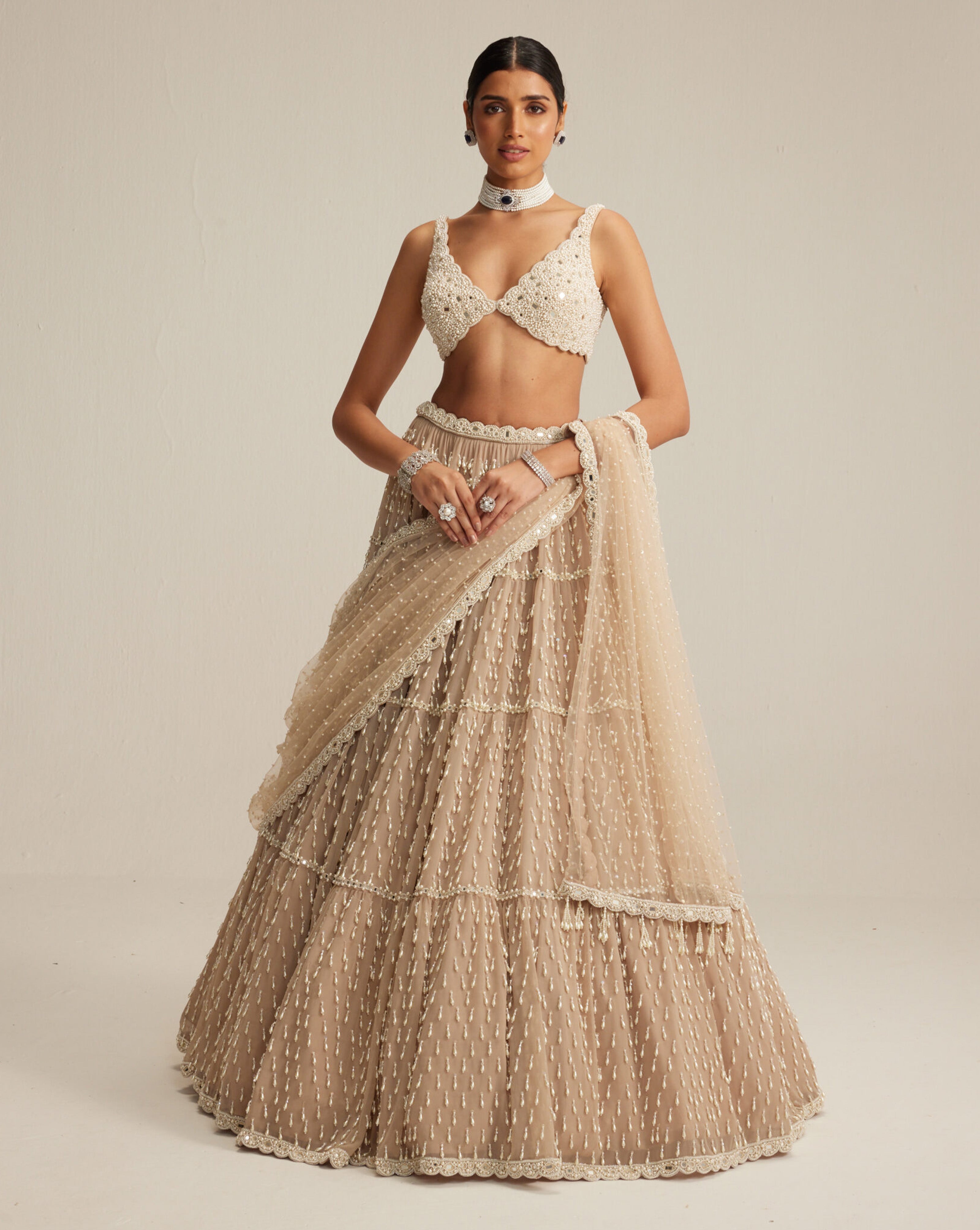 LightBeigePearlDropMultitierLehengawithVneckBlouse.jpg