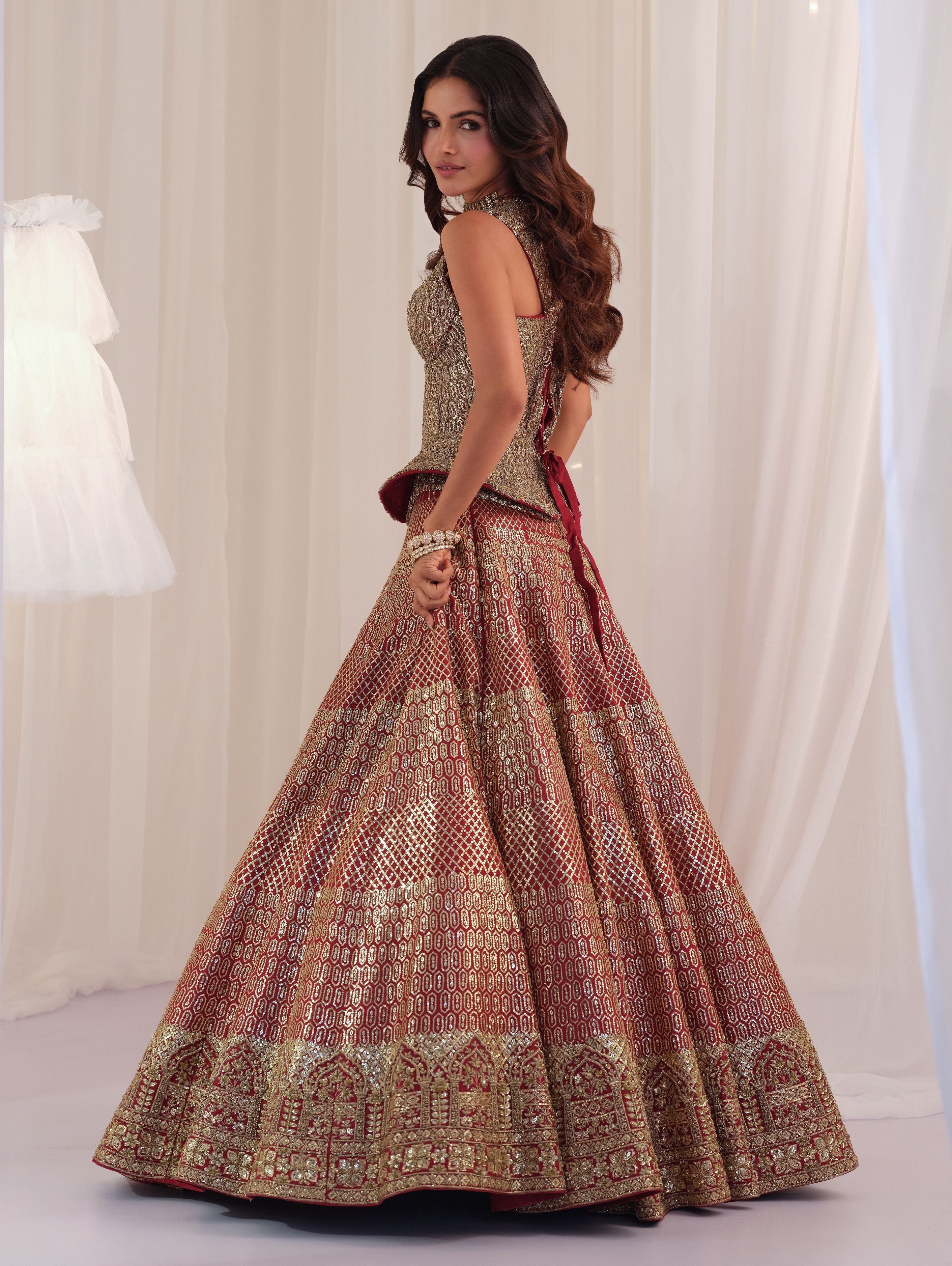 Maroon Raw Silk Lehenga With Peplum Sculpt Corset & Dupatta