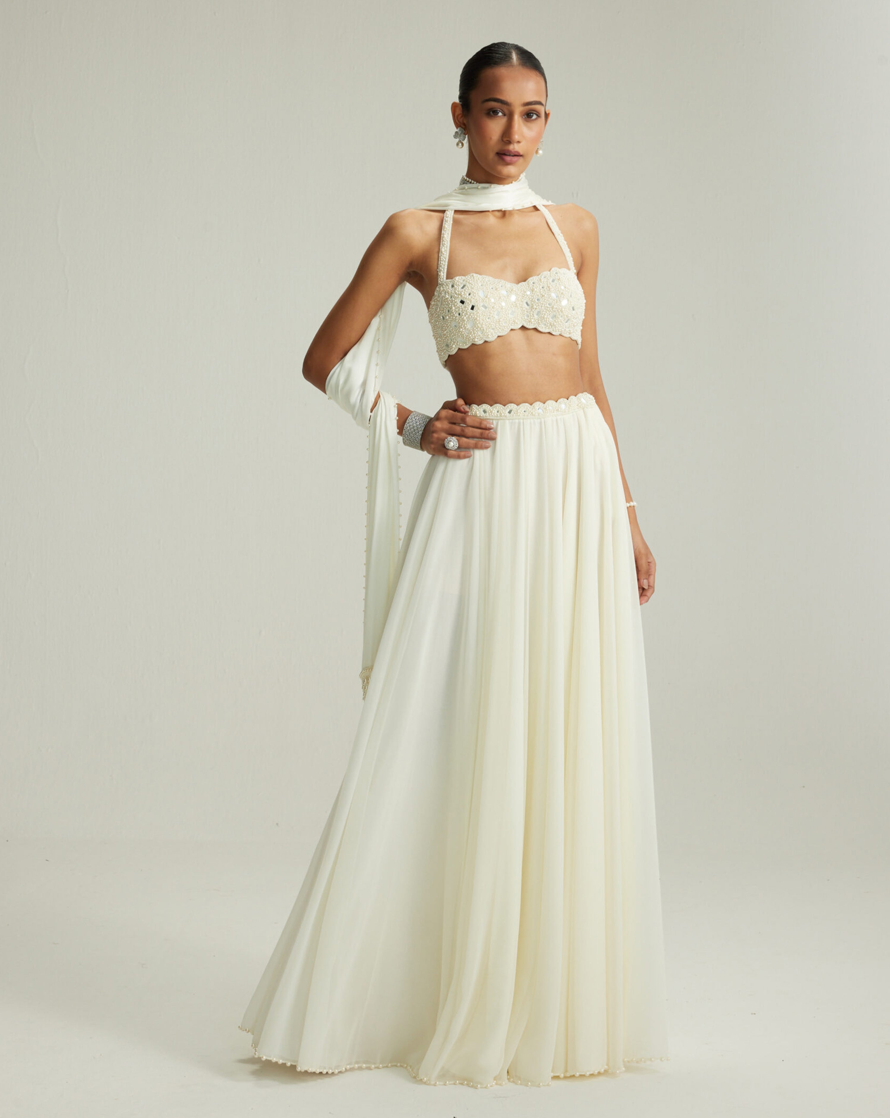 Off White Skirt Set With Halter Neck Blouse