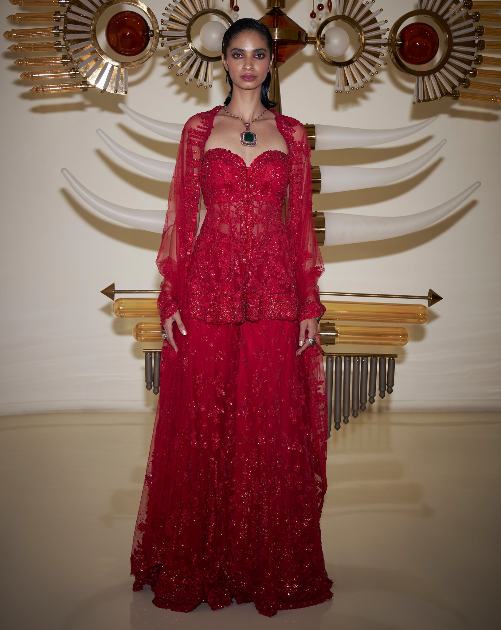 red sharara dress Beautiful red sharara suit, ideal for pre-wedding or Anand Karaj ceremonies. This bridal-inspired ensemble is fully hand-embroidered with dabka work and detailing on the shirt, flared sharara pants, and dupatta, creating a