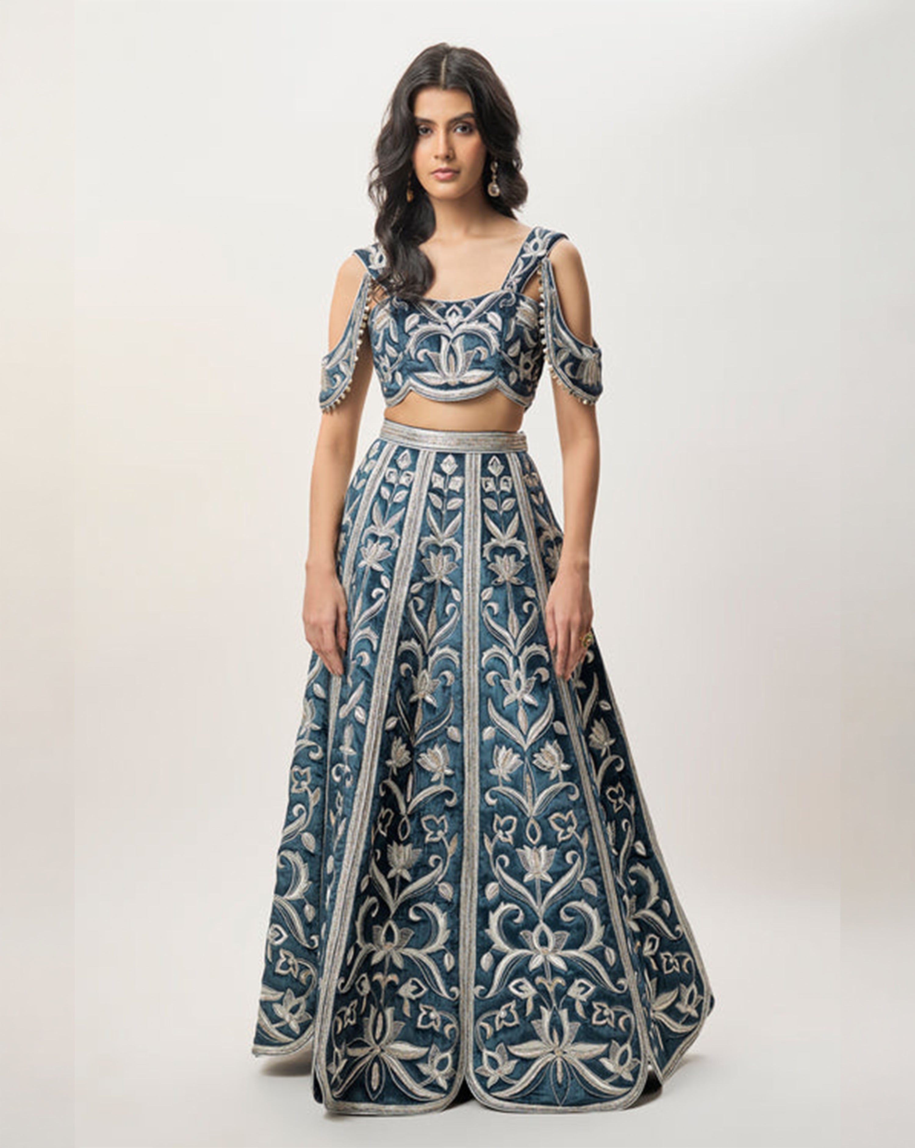 Sahar Navy Blue Velvet Quilted Embroidered Choli With Attached Embroidered Bajuband And Quilted Lehenga.