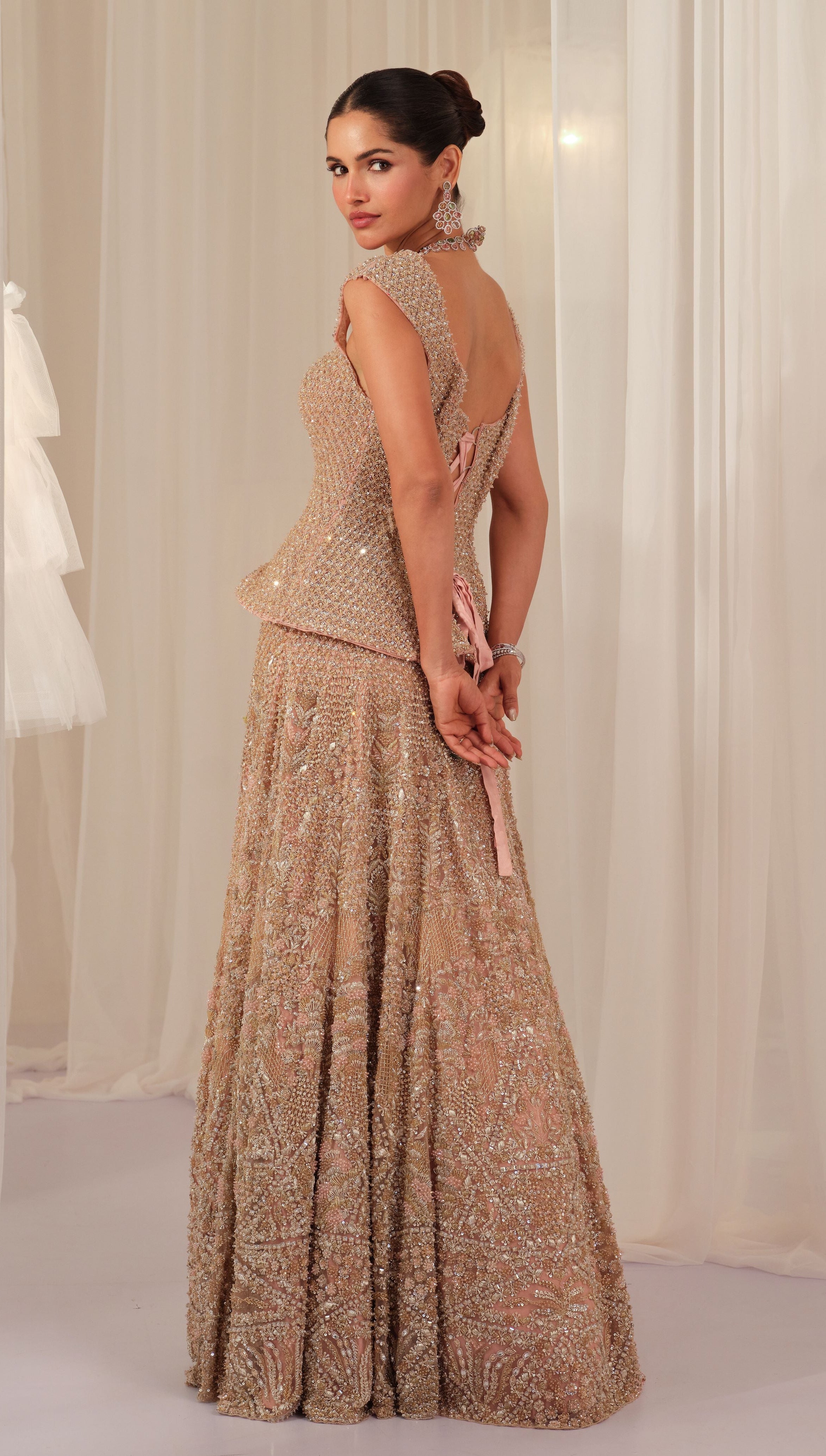 Soft Blush Hand Embellished Peplum Corset With Lehenga & Dupatta