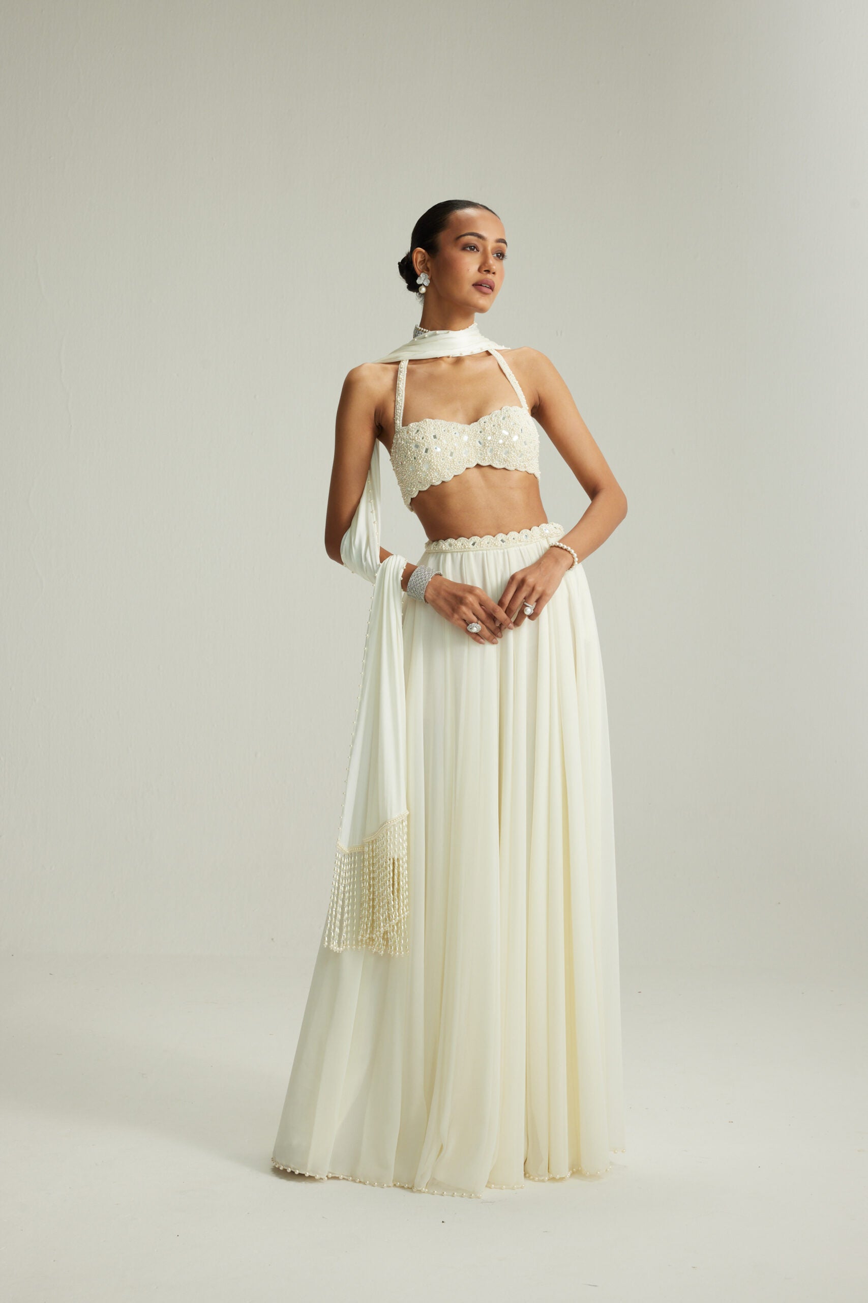 Off White Skirt Set With Halter Neck Blouse