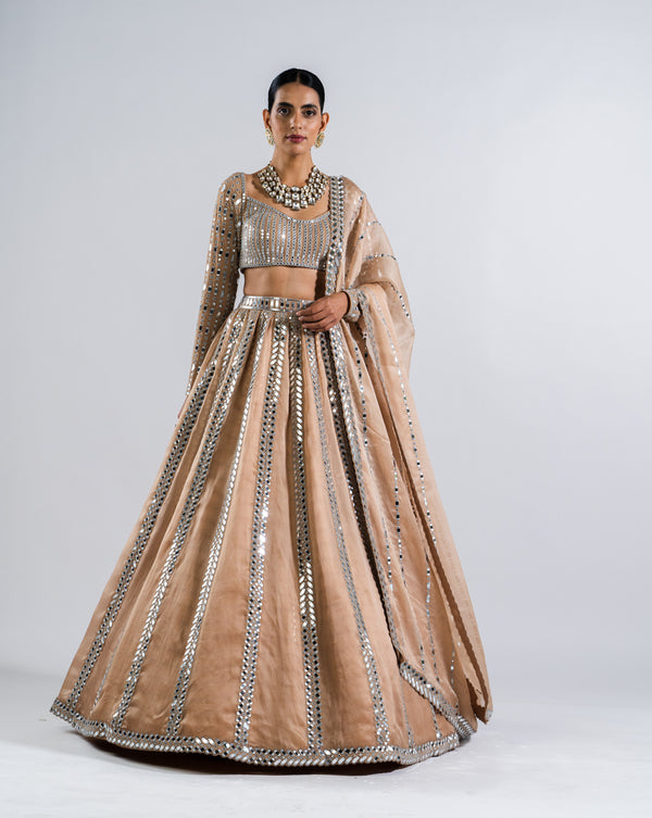 MUDRA's lehenga collections blend tradition and contemporary allure,  adorned with fine details that speak volumes of elegance. #lehengaa